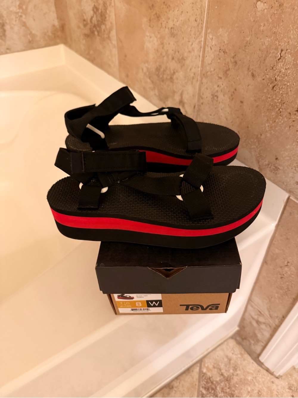 Teva Black Sandals with Red Midsole Stripe